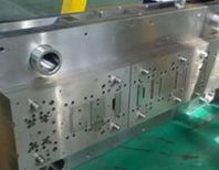 連續(xù)模模具沖壓件跳屑?jí)簜麊栴}分析